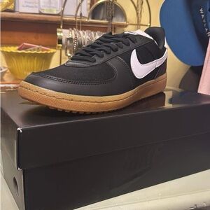 Nike Men’s Black Sneakers with White Swoosh and Gum Sole